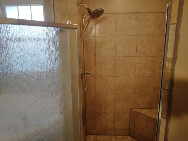 bathroom featuring a stall shower