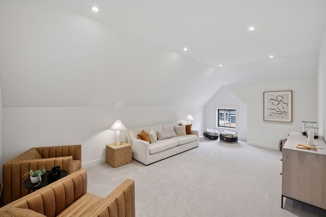 carpeted living area with recessed lighting, vaulted ceiling, and baseboards