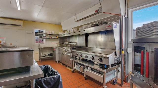 kitchen featuring an AC wall unit