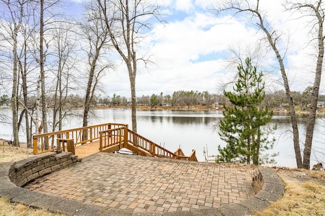 wooden deck with a water view
