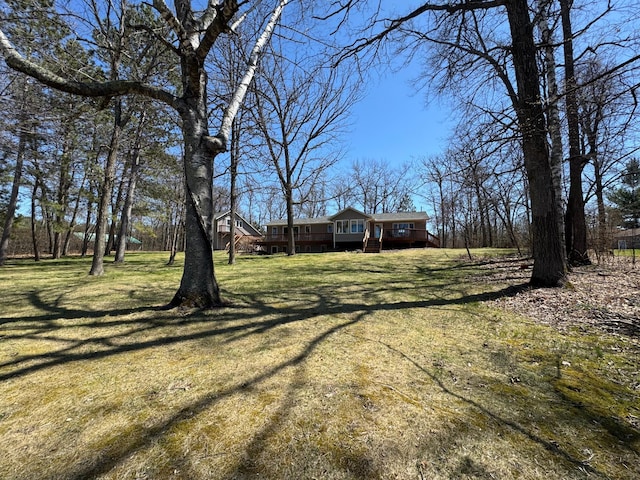 view of yard with a deck