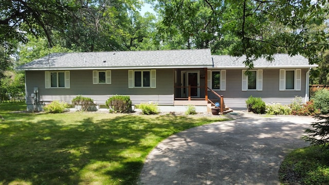 33853 Sand Rd, Sturgeon Lake, MN 55783 - view of front of home with a front lawn and covered porch