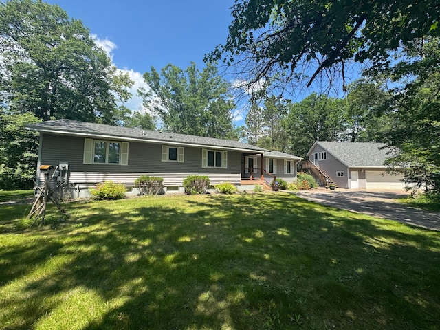 33853 Sand Rd, Sturgeon Lake, MN 55783 - ranch-style home with a front yard and a garage