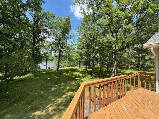 33853 Sand Rd, Sturgeon Lake, MN 55783 - deck featuring a water view, a yard, and view of wooded area