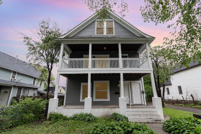 2807 17th Ave S, Minneapolis, MN 55407 - view of front of house with a balcony and covered porch