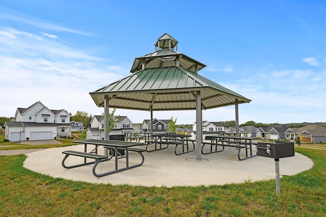 view of property's community with a gazebo and a residential view