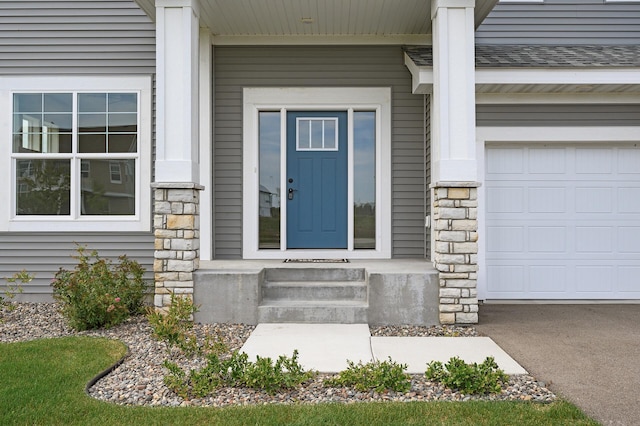 property entrance with stone siding