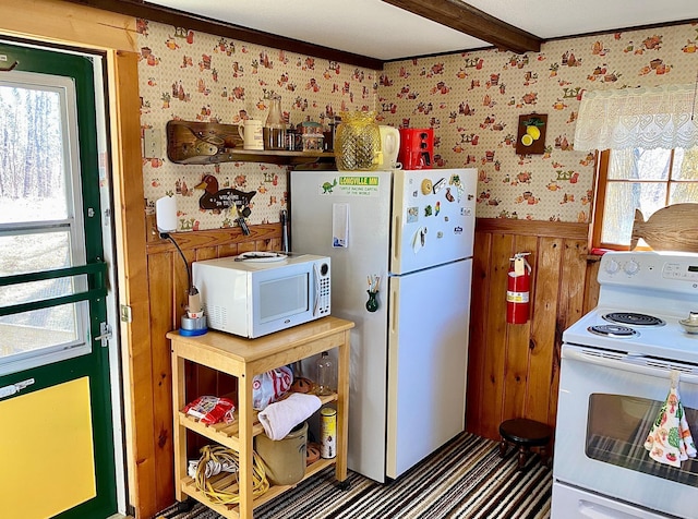 357 Glenmar Dr NE, Longville, MN 56655 - kitchen featuring white appliances, wallpapered walls, beamed ceiling, wood walls, and a wainscoted wall