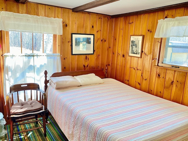 357 Glenmar Dr NE, Longville, MN 56655 - bedroom with wood walls and beamed ceiling