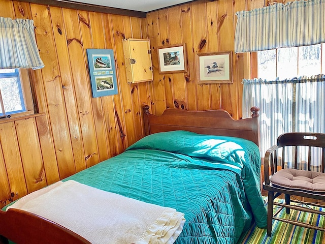 357 Glenmar Dr NE, Longville, MN 56655 - bedroom featuring wood walls