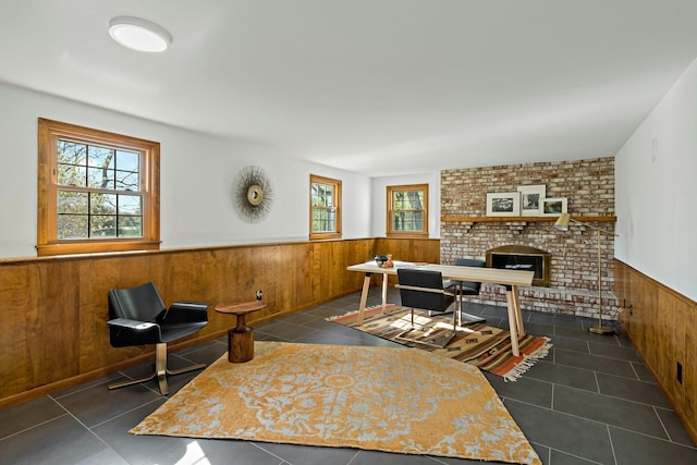 5 Shore Rd, North Oaks, MN 55127 - tiled living area featuring wainscoting, wooden walls, and a brick fireplace