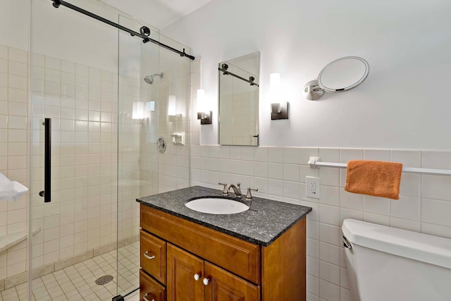 5 Shore Rd, North Oaks, MN 55127 - full bathroom with a shower stall, vanity, tile walls, and toilet