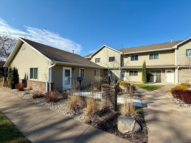 1513 Creek Meadows Dr NW, Coon Rapids, MN 55433 - view of front of property featuring brick siding