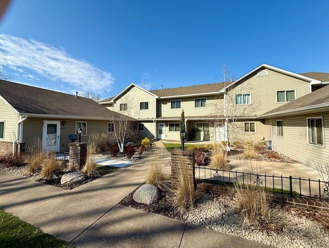 1513 Creek Meadows Dr NW, Coon Rapids, MN 55433 - back of property featuring a residential view
