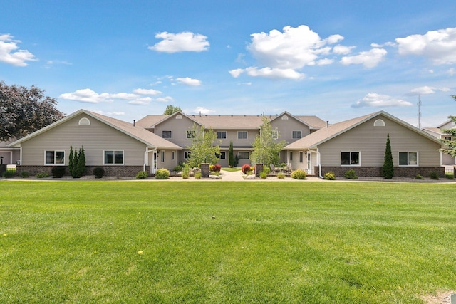 1513 Creek Meadows Dr NW, Coon Rapids, MN 55433 - view of front of property with a front yard and brick siding