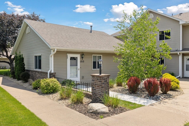 1513 Creek Meadows Dr NW, Coon Rapids, MN 55433 - view of front of house with roof with shingles