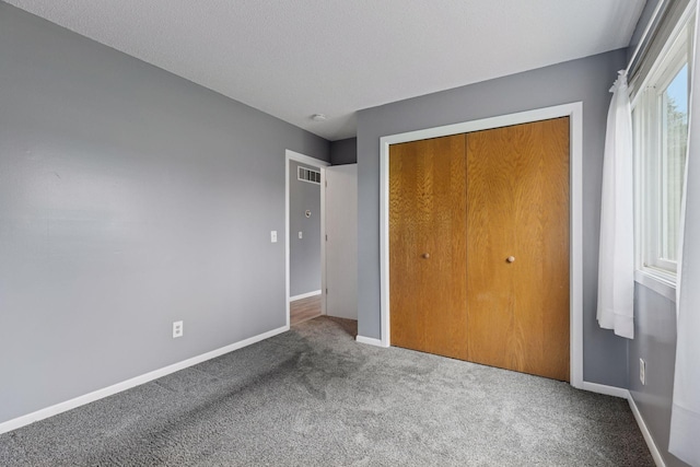 1513 Creek Meadows Dr NW, Coon Rapids, MN 55433 - unfurnished bedroom with carpet flooring and a closet
