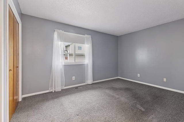 1513 Creek Meadows Dr NW, Coon Rapids, MN 55433 - spare room with carpet and a textured ceiling