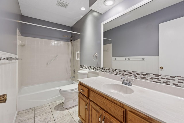 1513 Creek Meadows Dr NW, Coon Rapids, MN 55433 - bathroom with vanity,  shower combination, backsplash, and tile patterned floors