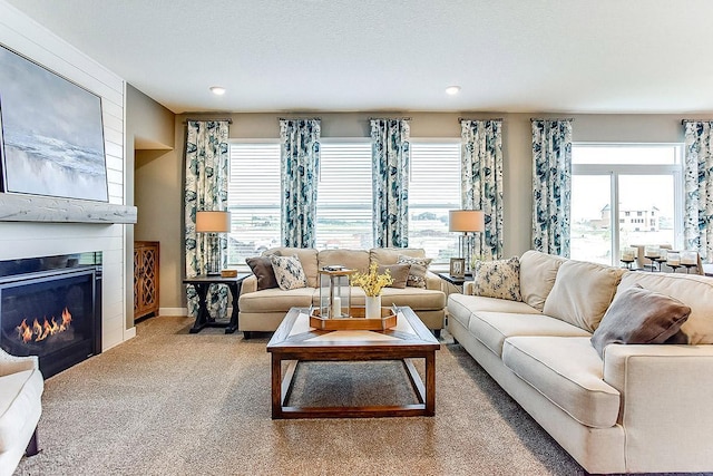 528 Goldenrod Trl, Waconia, MN 55387 - living room featuring a fireplace, carpet, and recessed lighting