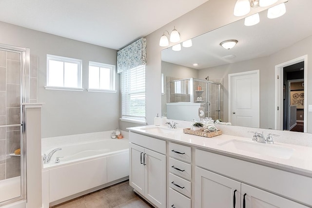 528 Goldenrod Trl, Waconia, MN 55387 - full bath featuring a shower stall, double vanity, and a garden tub