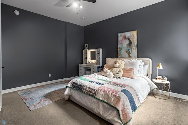 bedroom featuring carpet, baseboards, and a ceiling fan