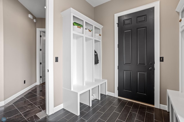 mudroom featuring baseboards