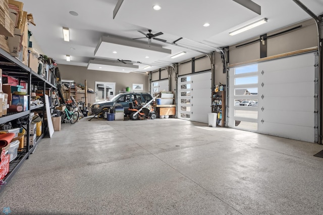 garage with a ceiling fan and recessed lighting