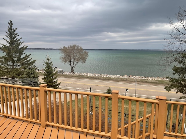 36074 County Highway 72, Everts Twp, MN 56515 - wooden deck with a water view