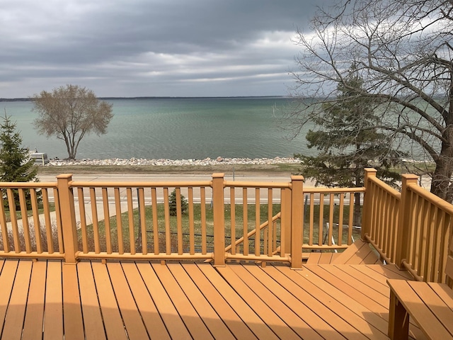 36074 County Highway 72, Everts Twp, MN 56515 - wooden terrace featuring a water view