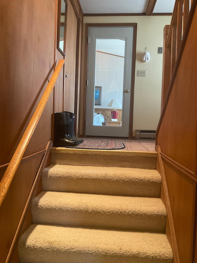 36074 County Highway 72, Everts Twp, MN 56515 - stairway featuring baseboard heating and tile patterned flooring