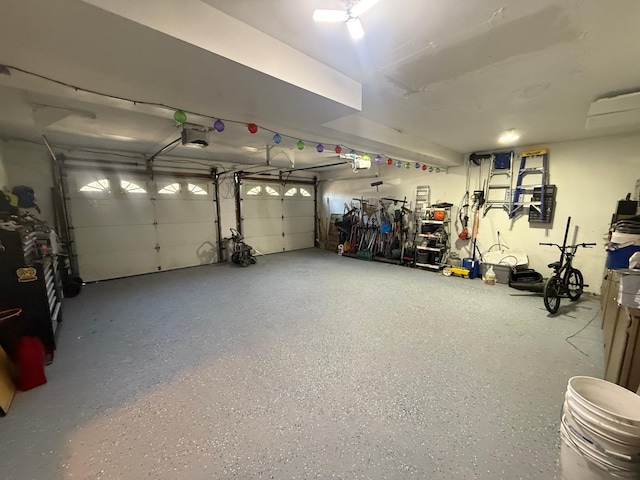 garage featuring a garage door opener