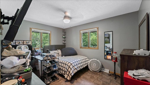 19593 Minnesota Highway 22, Greenleaf Twp, MN 55355 - bedroom with a textured ceiling, baseboards, and ceiling fan