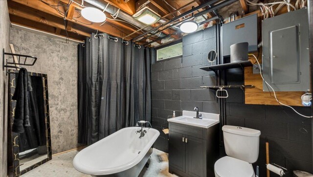 19593 Minnesota Highway 22, Greenleaf Twp, MN 55355 - bathroom with electric panel, a freestanding tub, toilet, vanity, and curtained shower