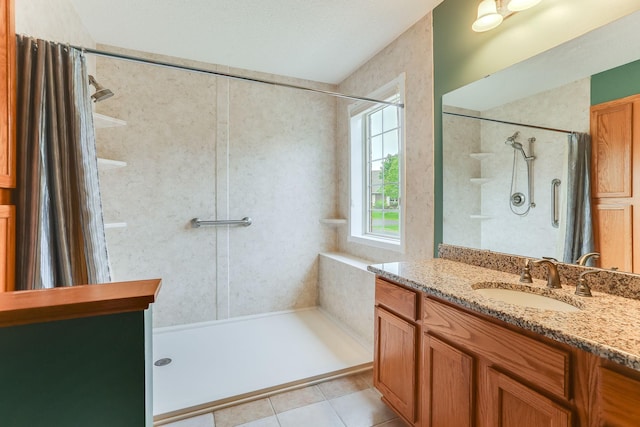 13409 44th Cir NE, Saint Michael, MN 55376 - full bathroom with a shower with shower curtain, vanity, and tile patterned floors
