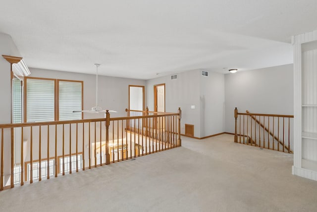 13409 44th Cir NE, Saint Michael, MN 55376 - hallway with an upstairs landing, carpet, and baseboards