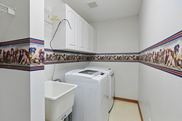 13409 44th Cir NE, Saint Michael, MN 55376 - laundry room with washer and dryer, cabinet space, light flooring, and baseboards
