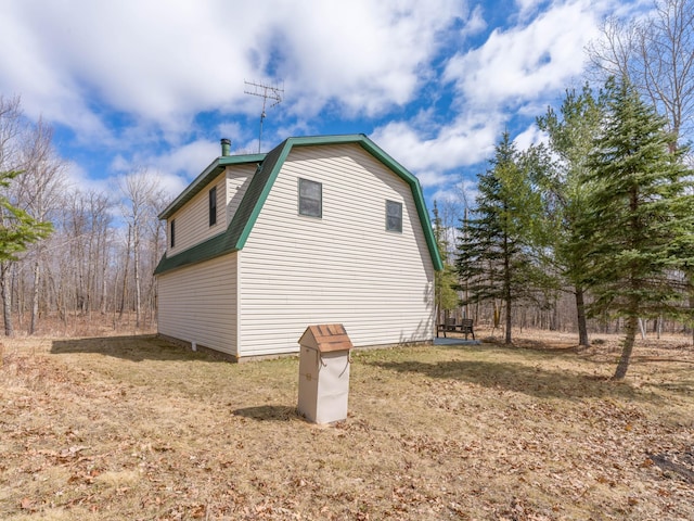 10823 Bollenbacher Rd, Garrison Twp, MN 56401 - view of side of property with a gambrel roof
