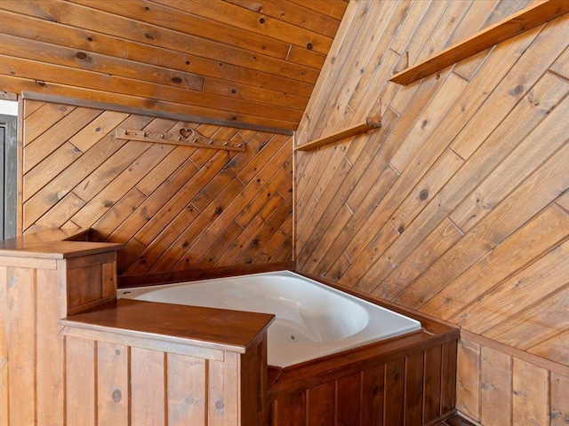 full bath featuring wooden walls and a whirlpool tub