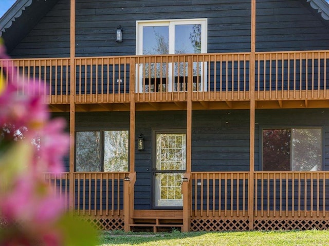 14122 13th Ave SW, Sylvan Twp, MN 56473 - back of house featuring a balcony