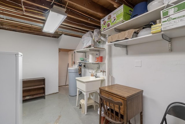 basement with fridge