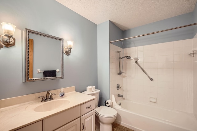 bathroom with a textured ceiling, toilet, shower / washtub combination, vanity, and tile patterned floors
