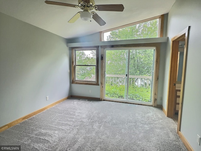 7861 Greer Ave NW, Maple Lake, MN 55358 - carpeted spare room with ceiling fan, vaulted ceiling, and baseboards