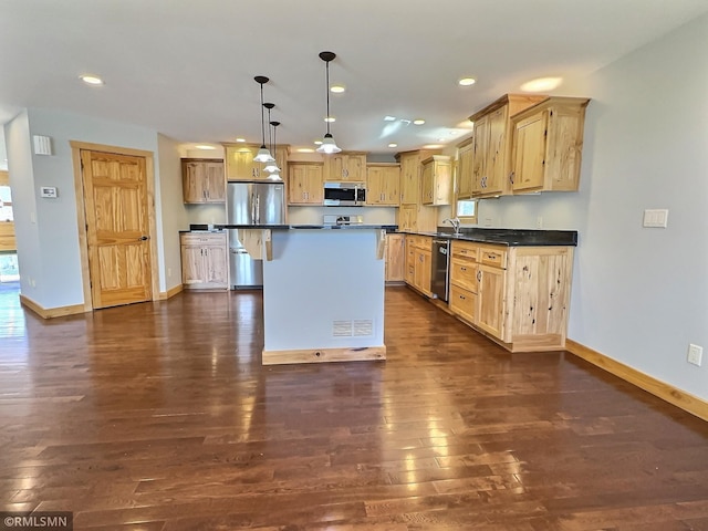 7861 Greer Ave NW, Maple Lake, MN 55358 - kitchen featuring stainless steel appliances, baseboards, dark wood-style floors, dark countertops, and recessed lighting