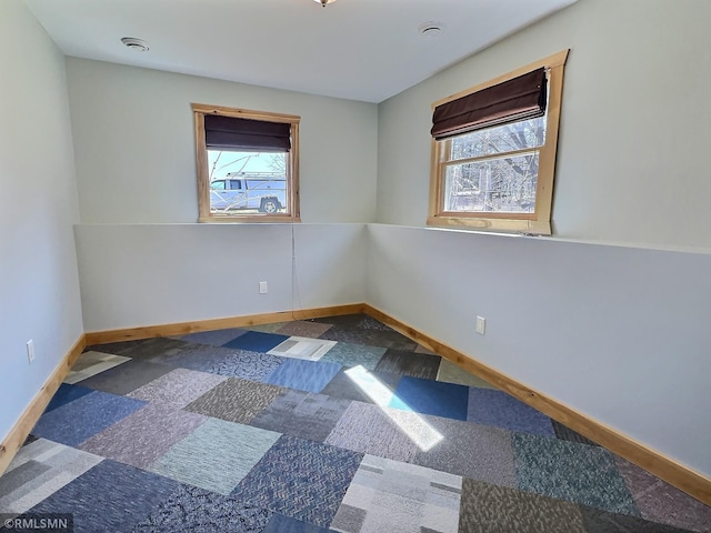 7861 Greer Ave NW, Maple Lake, MN 55358 - spare room featuring baseboards