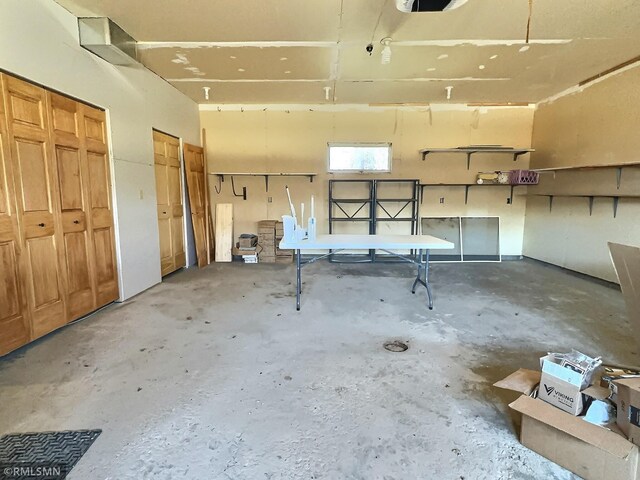 7861 Greer Ave NW, Maple Lake, MN 55358 - garage featuring a garage door opener
