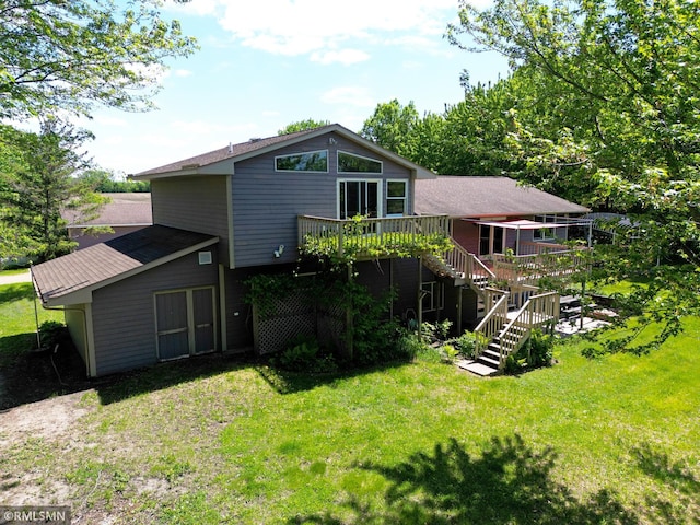 7861 Greer Ave NW, Maple Lake, MN 55358 - rear view of house with stairway, a wooden deck, and a lawn