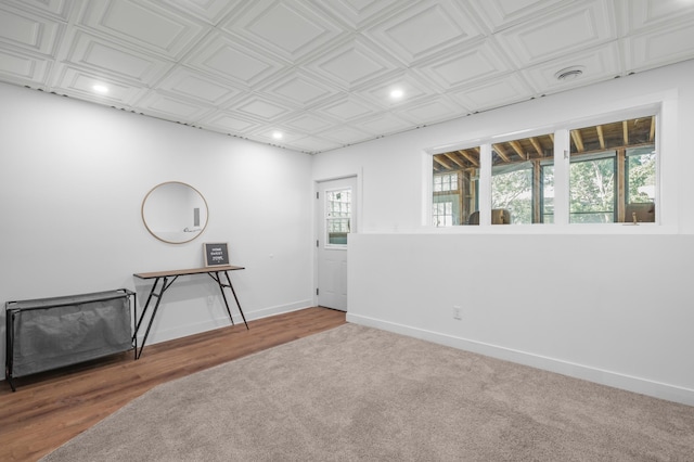 613 Cromwell Ave, Saint Paul, MN 55104 - spare room featuring baseboards, recessed lighting, an ornate ceiling, and wood finished floors