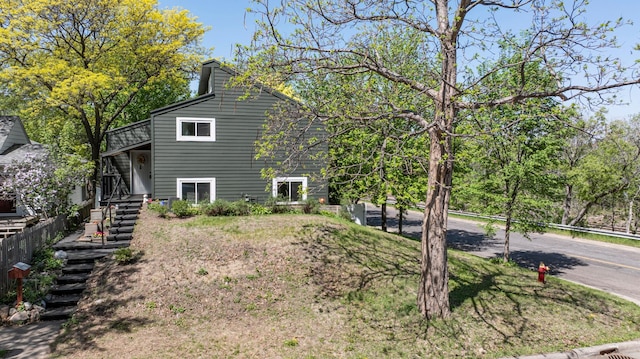 613 Cromwell Ave, Saint Paul, MN 55104 - view of home's exterior featuring stairway and a balcony