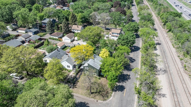 613 Cromwell Ave, Saint Paul, MN 55104 - aerial view of property and surrounding area featuring nearby suburban area and a tree filled landscape
